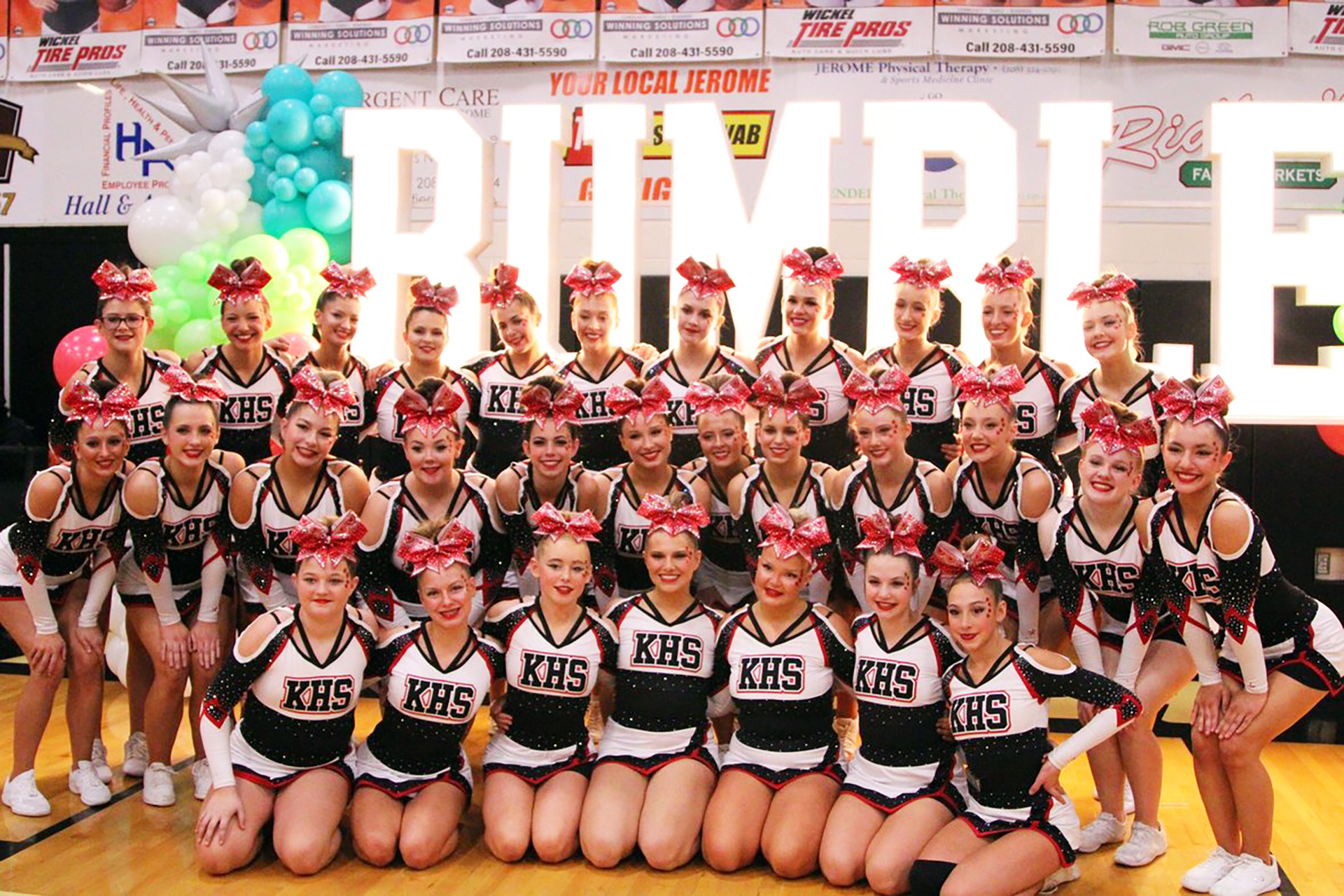 The KHS cheerleaders pose during a competition at Jerome High School. | Photo via Jaci Cowger