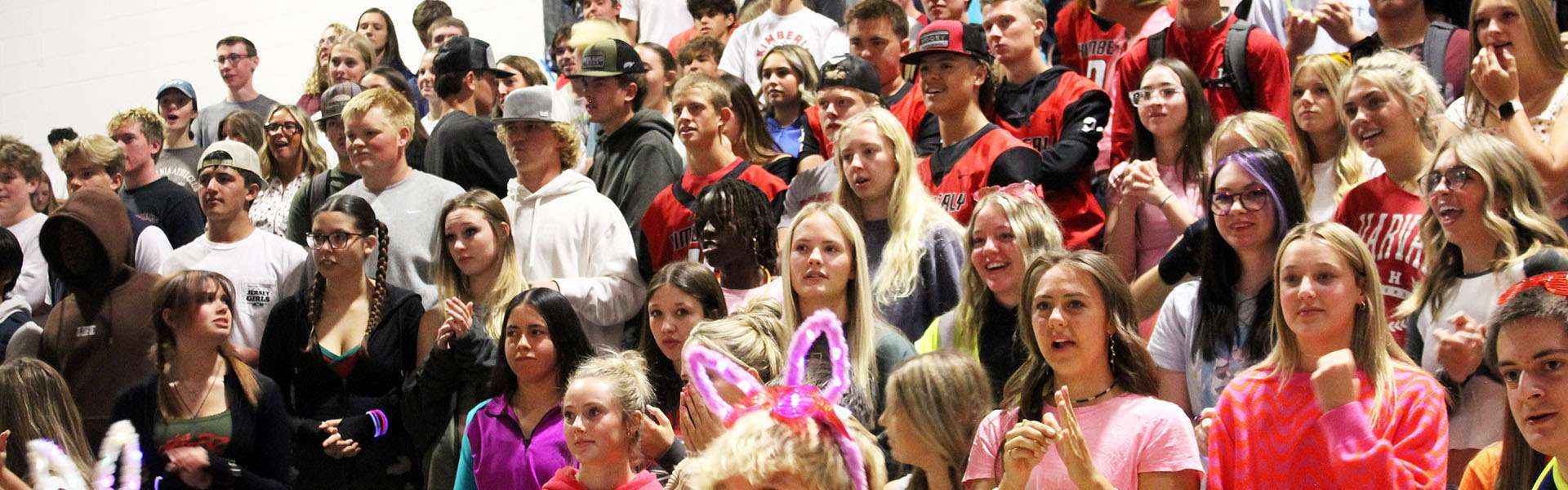 Students cheer during the back-to-school neon assembly. | Photo by Clara Anderson