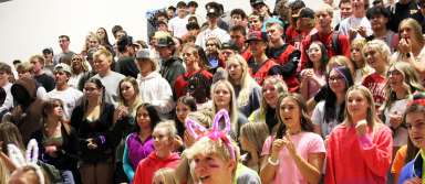 Students cheer during the back-to-school neon assembly. | Photo by Clara Anderson