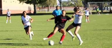 KHS sophomore Emma Chavez battles for the ball during a game against Declo this season. | Photo by Avily Davis