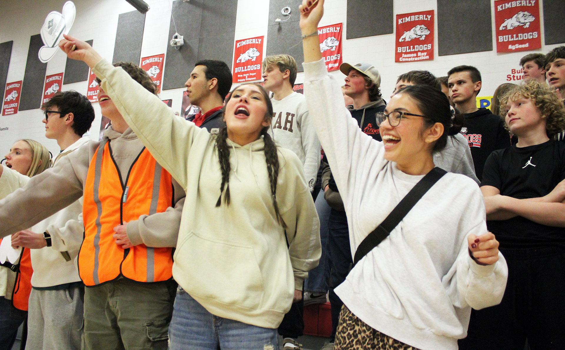 Seniors Anna Solomon (left) and Noelia Juarez cheer during a boys basketball game against Buhl this season. | Photo by Kaya Thomas Seniors Anna Solomon (left) and Noelia Juarez cheer during a boys basketball game against Buhl this season. | Photo by Kaya Thomas