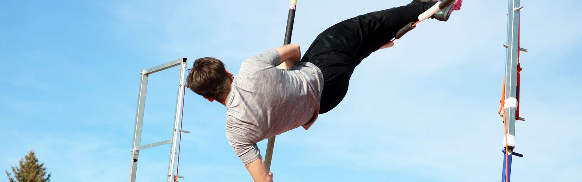 Senior Nolan Klimes pole vaults during practice. | Photo by Jaci Cowger