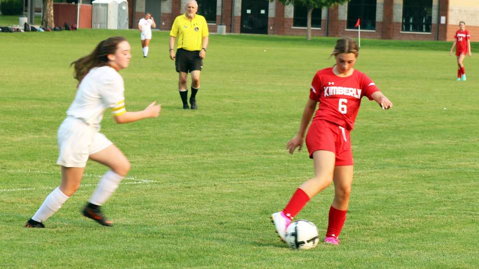 Sydney Wayment plays the ball during a game last season. | Photo by Publications staff