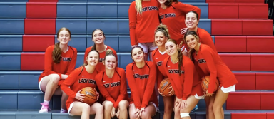 The girls basketball team poses for a picture before a game against Filer this season. | Submitted photo